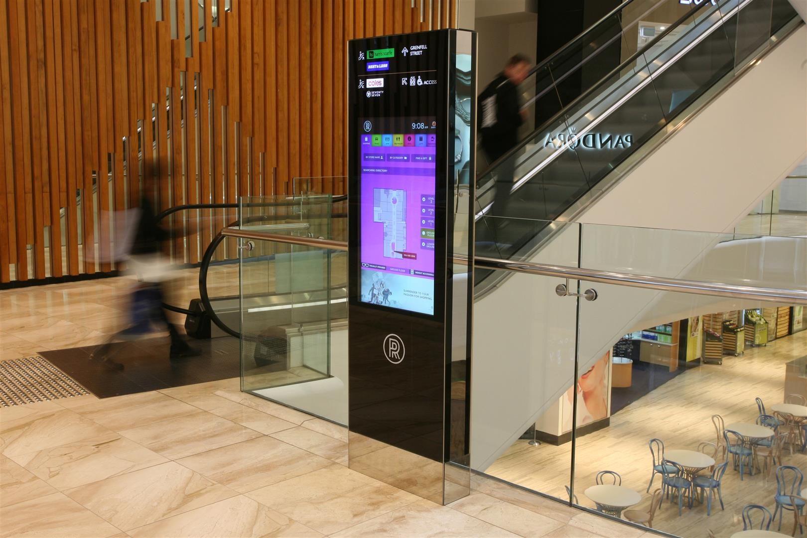 A wayfinding totem beside an escalator at Rundle Place shopping centre