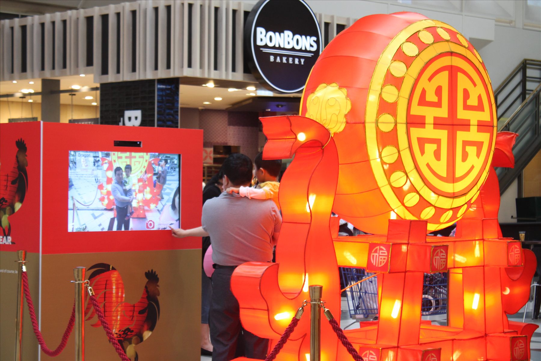 A Lunar New Year lantern and interactive photo booth in a shopping centre