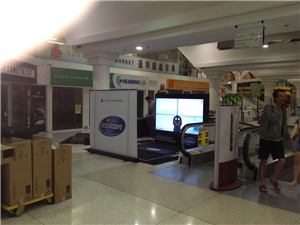 The Purina Total Care display seen from across the shopping centre