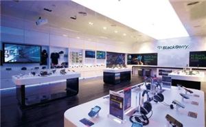 A BlackBerry store interior with display tables and mounted screens