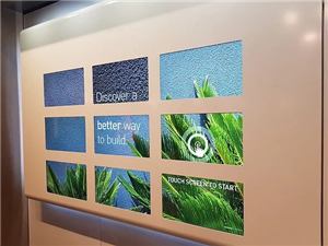 A Hebel interactive display with a touch screen to start prompt