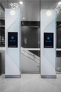 Two Star City Sydney wayfinding columns beside a staircase