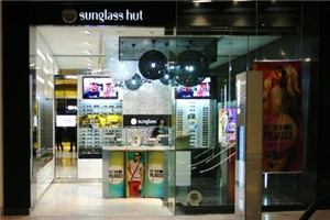 The Sunglass Hut store front with digital screens